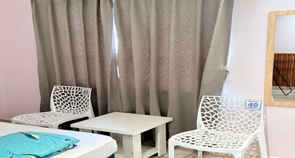 Indraprastha Airbnb & Homestay Room Type - Deluxe room AC