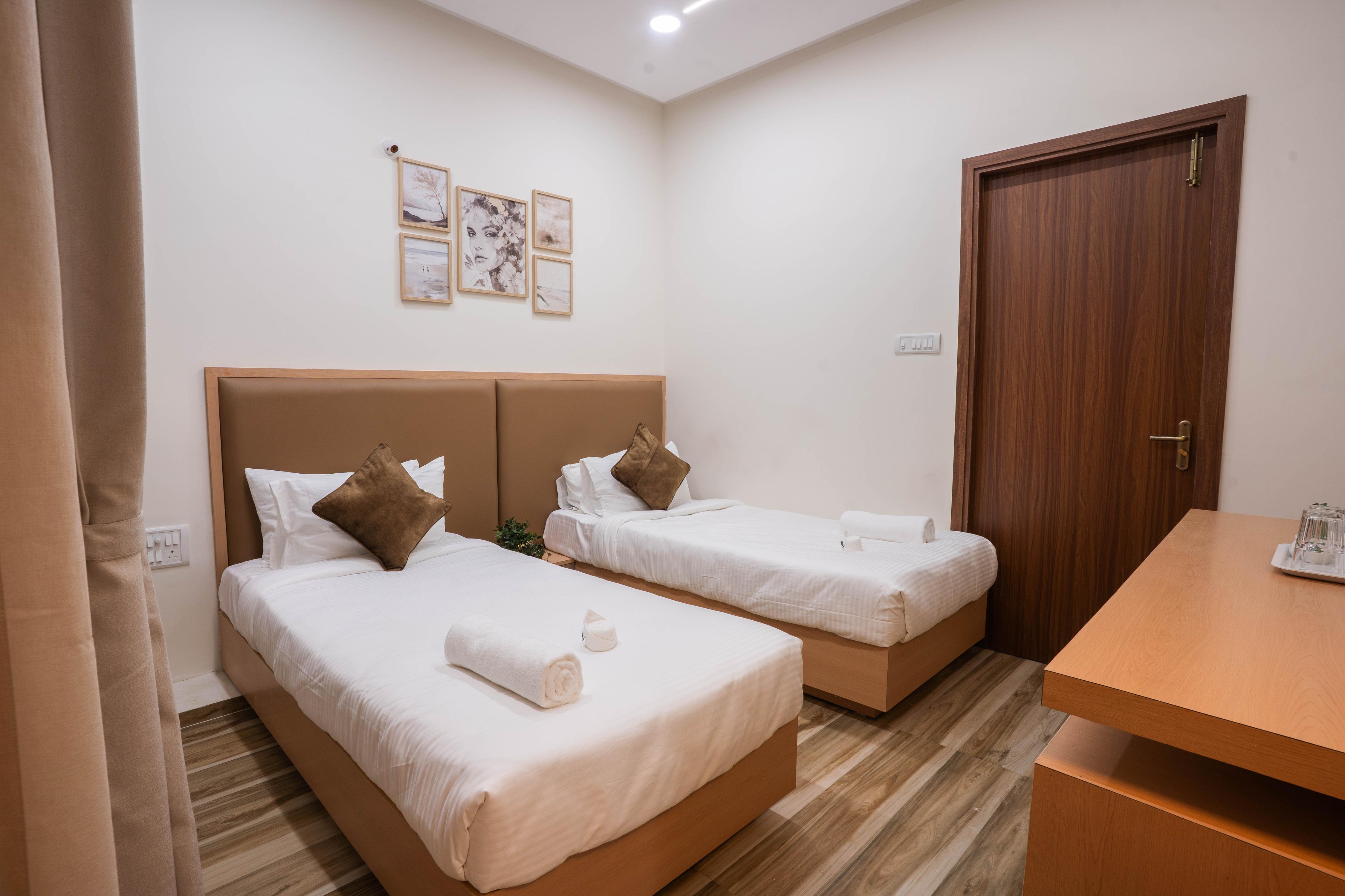 Sri Utham Suites - Tap to explore photos