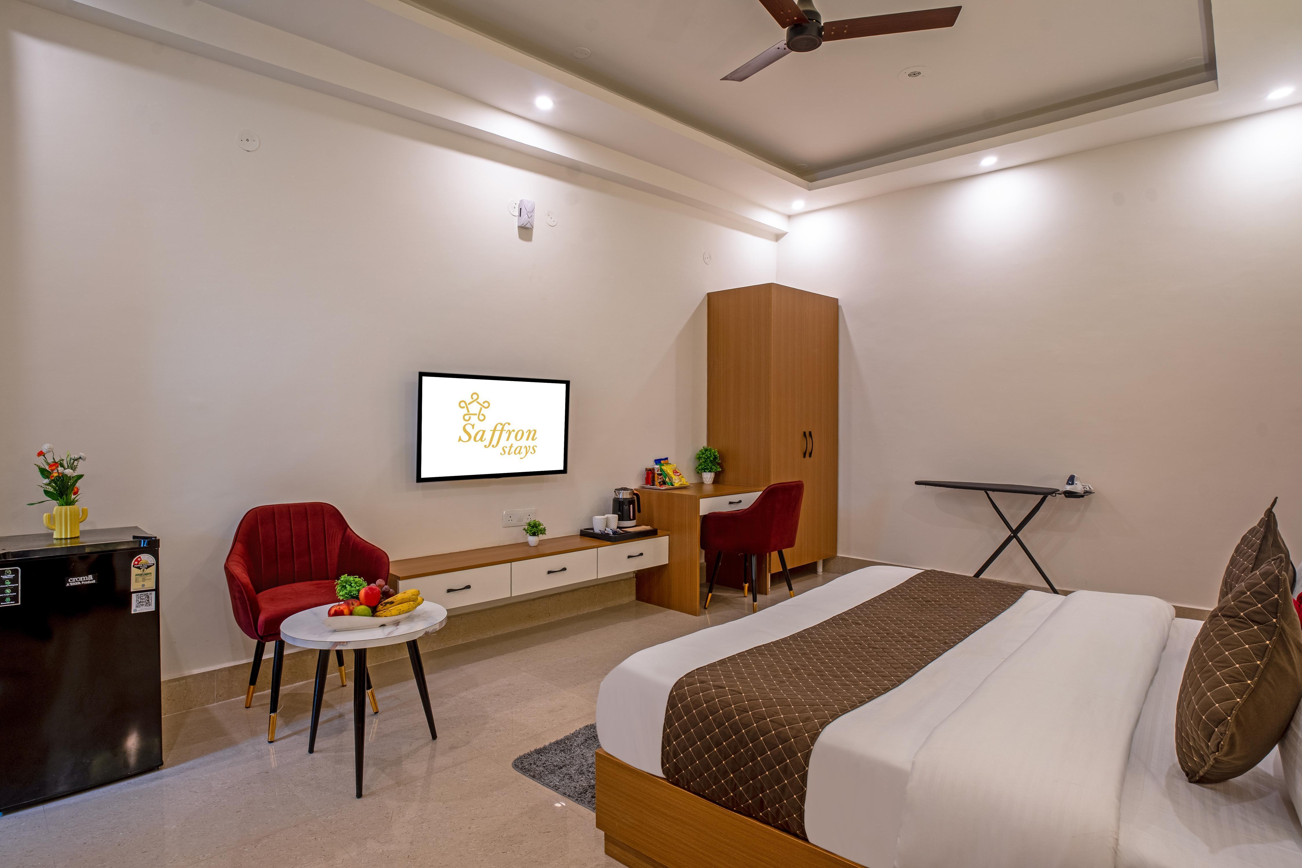 Hotel Saffron Stays - Tap to explore photos