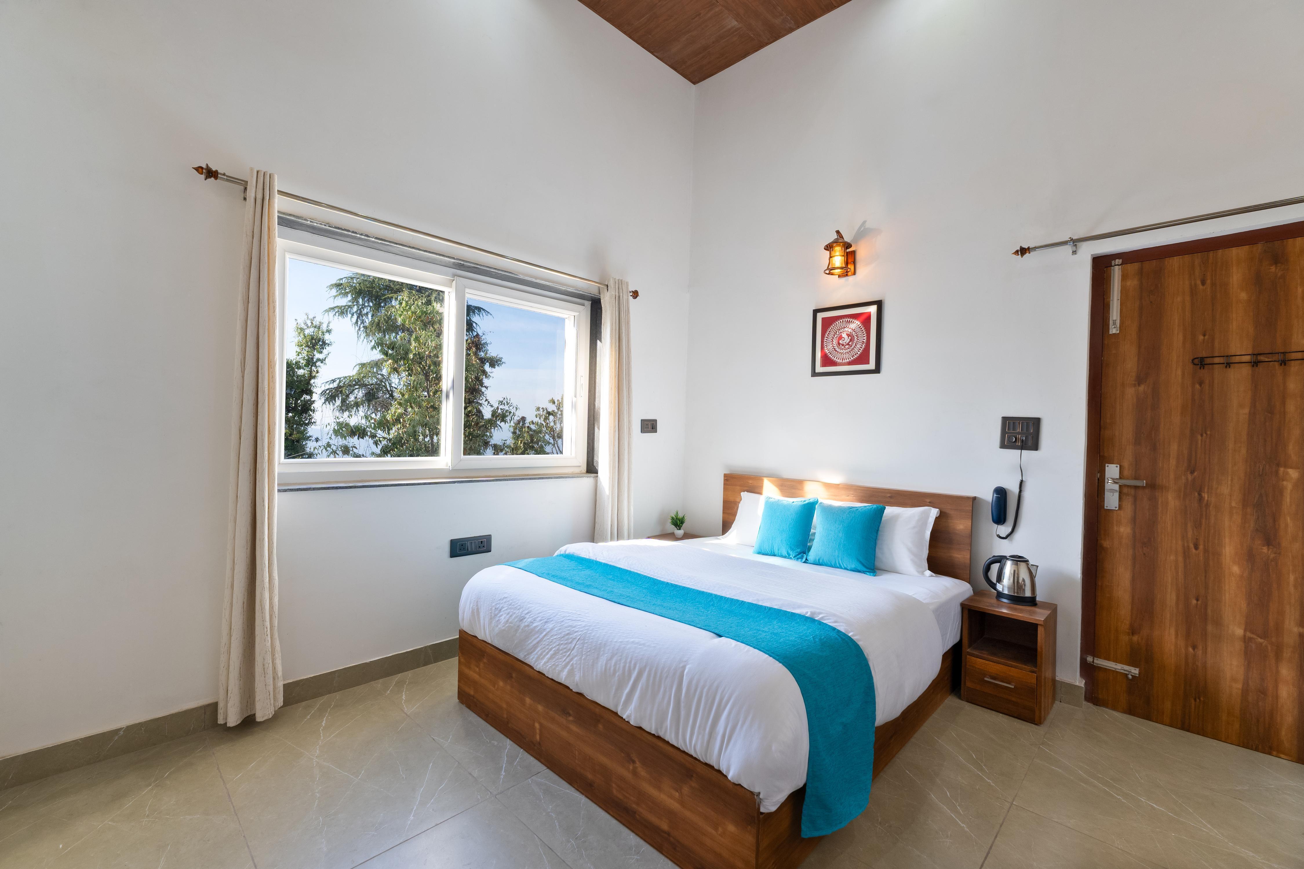 Deluxe Studio Room at Kaafal Cottage - Tap to explore photos
