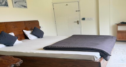 Flowstel Rishikesh Room Type - Deluxe Double AC Room with Ganga and Mountain View