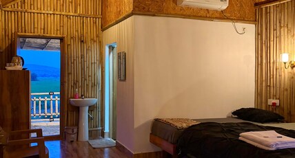 Hampi BoulderNest Room Type - AC Bamboo Cottages - Mountain & Paddy Field View
