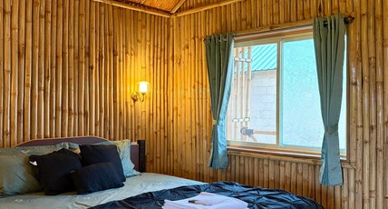 Hampi BoulderNest Room Type - Non-AC Bamboo Cottages - Balcony & Garden View