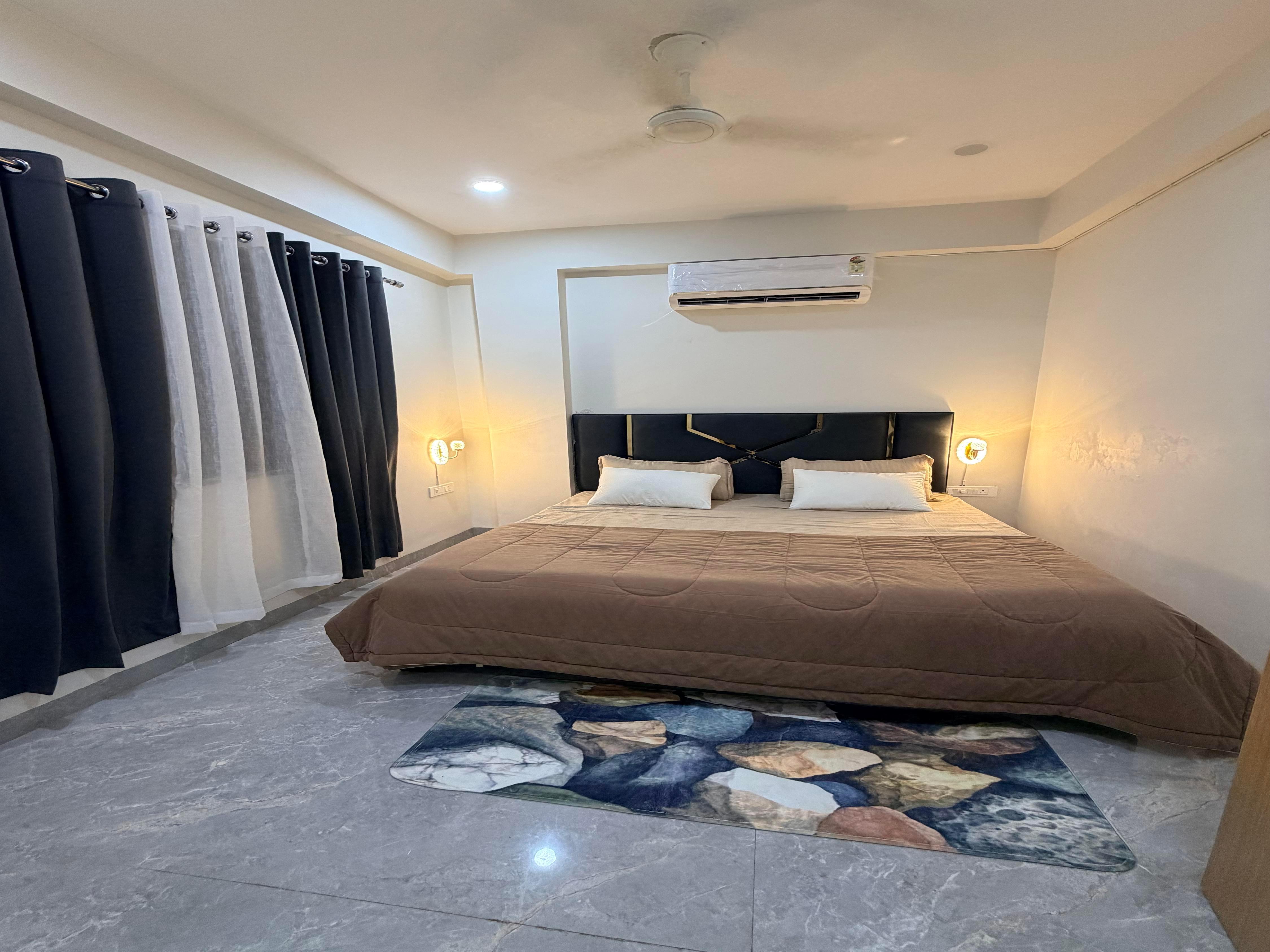 Cozy 1BHK in Indore Rooftop AC Free Parking - Tap to explore photos