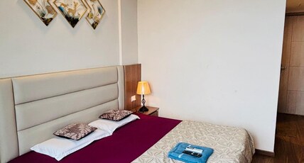 Skybloom Stays Omaxe Self Check in Room Type - Bedroom