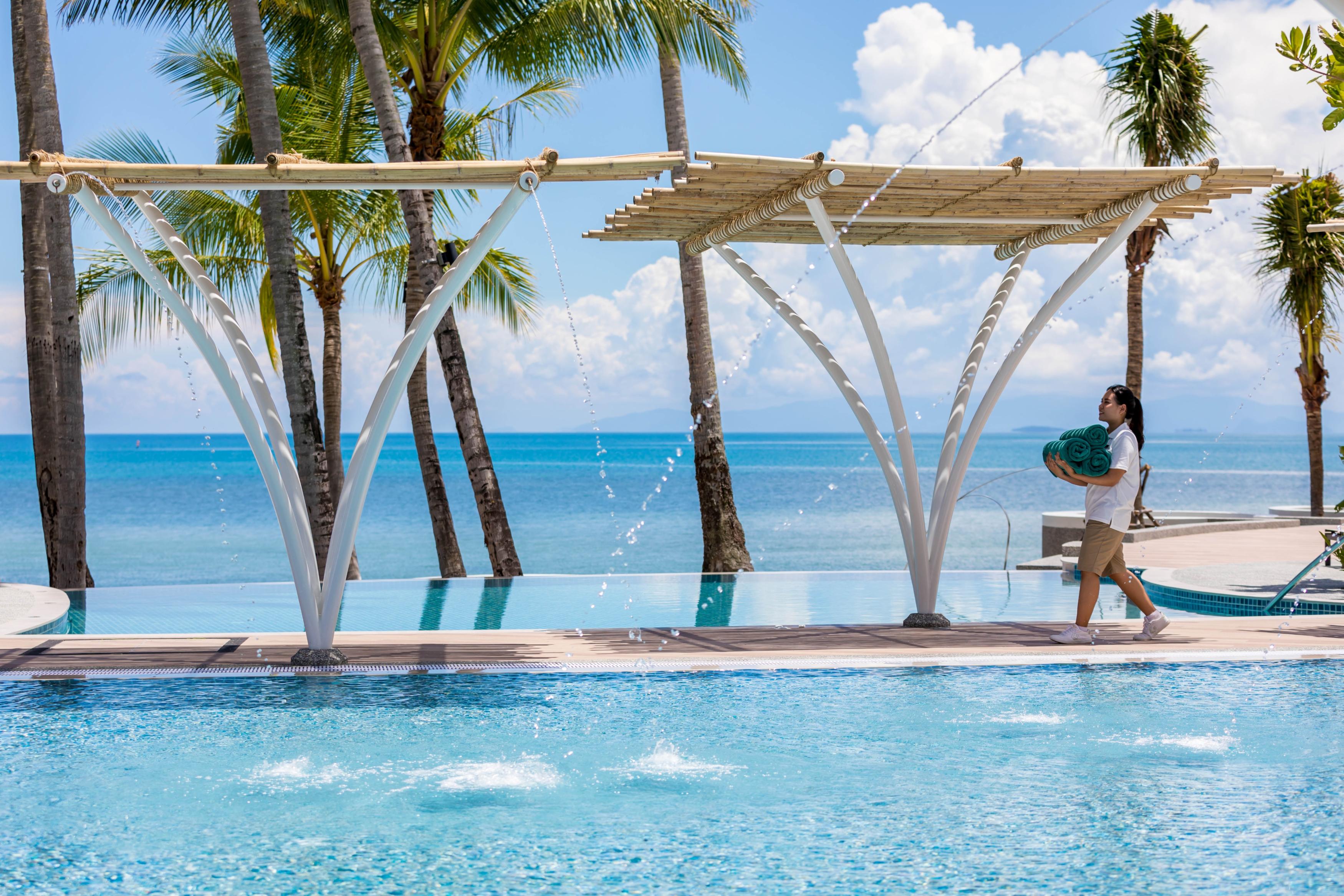 Outrigger Koh Samui Beach Resort - Tap to explore photos