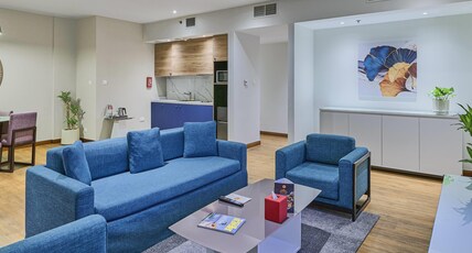Ramada Hotel and Suites by Wyndham JBR Room Type - 1-Bedroom King Suite, Partial Sea View
