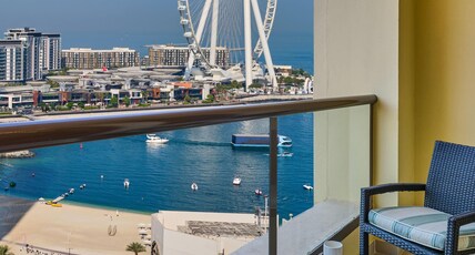 Ramada Hotel and Suites by Wyndham JBR Room Type - 1-Bedroom King Suite, Balcony, Partial Sea View