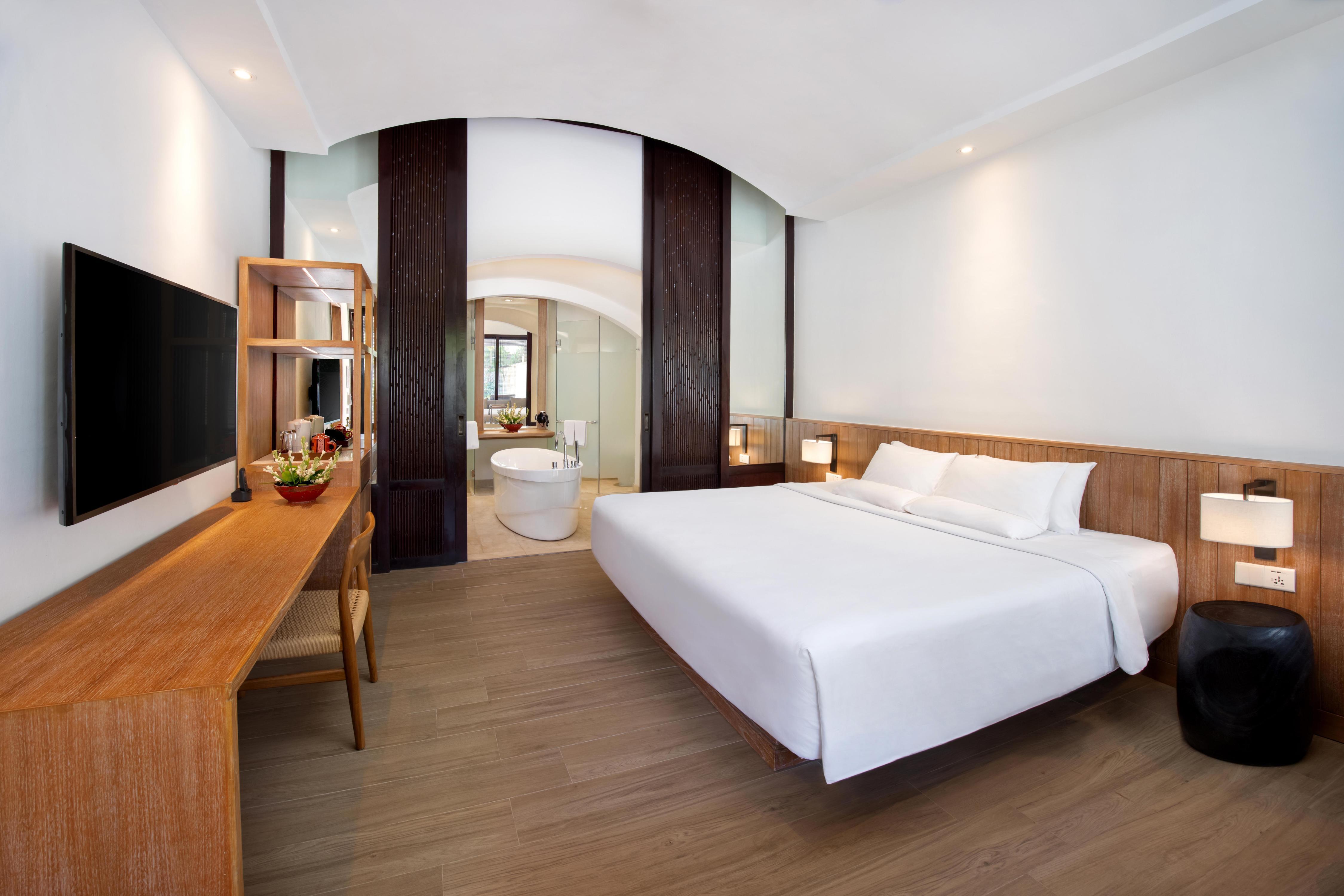 Novotel Bali Benoa Room Type - Family Suite with 1 king bed, 2 single beds and separate living area located in the Beach Wing Novotel Bali Benoa Room Type - Family Suite with 1 king bed, 2 single beds and separate living area located in the Beach Wing