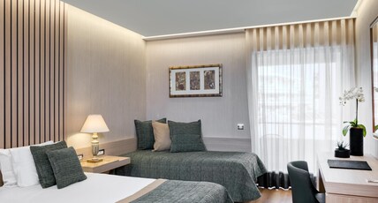 DIVANI PALACE ACROPOLIS Room Type - EXECUTIVE TRIPLE ROOM