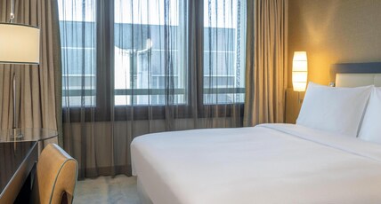 Hilton Geneva Hotel & Conference Centre Room Type - FAMILY CONNECTING ROOM Hilton Geneva Hotel & Conference Centre Room Type - FAMILY CONNECTING ROOM