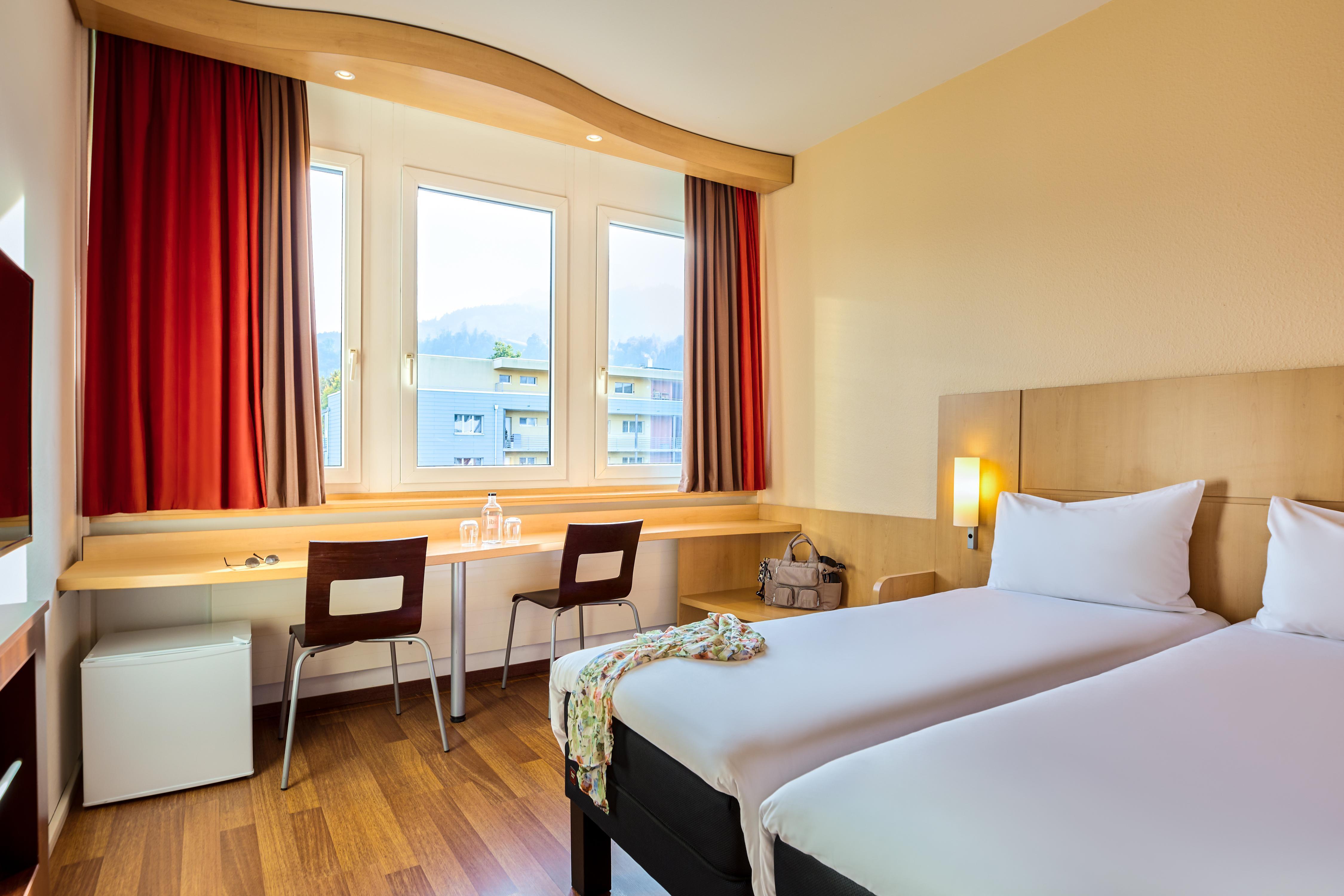 ibis Luzern Kriens Room Type - Room with 2 single beds (80 x 200 cm) new sleep comfort, view of Pilatus