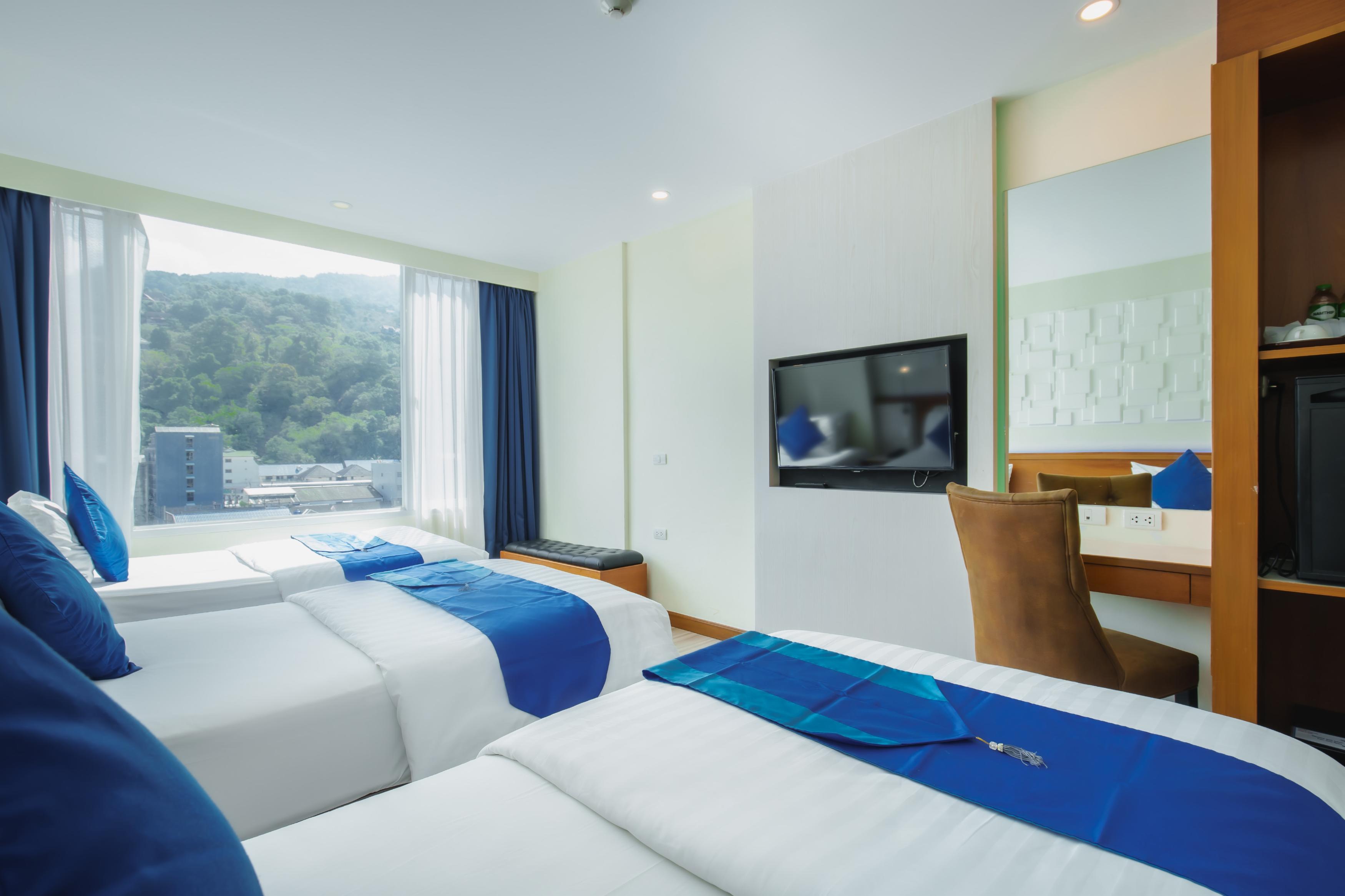 Sira Grande Hotel Patong - Tap to explore photos