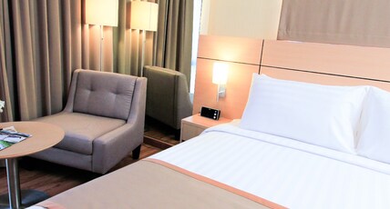 Petals Inn Room Type - Deluxe Double Room
