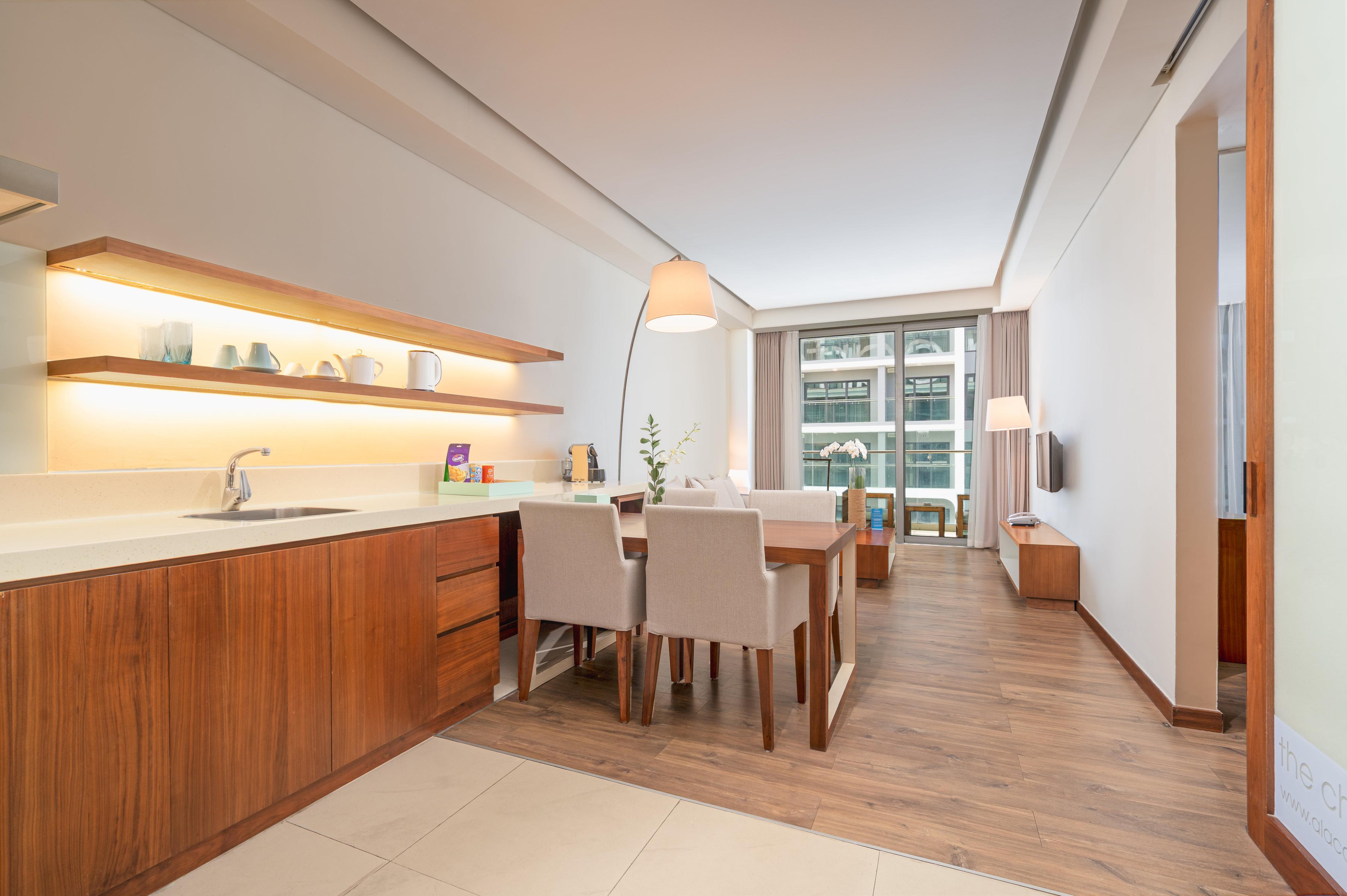 A La Carte Danang Beach Hotel Room Type - One-bedroom City View Suite with Balcony