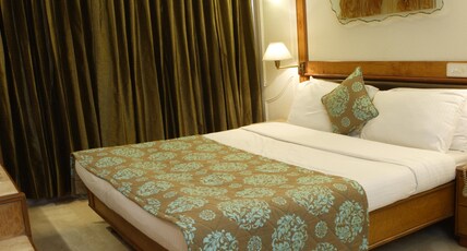 Regal Enclave Room Type - Deluxe Room