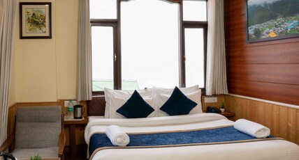 Hotel Woodrina Room Type - Deluxe Room - Forest partial view Free heater Hotel Woodrina Room Type - Deluxe Room - Forest partial view Free heater