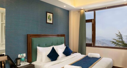 Hotel Woodrina Room Type - Super Deluxe room- Forest View free heater Hotel Woodrina Room Type - Super Deluxe room- Forest View free heater
