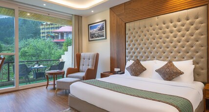 Snow Valley Resorts & Spa (A Centrally Heated Mountain Side Resorts ) Room Type - Premium Room ( With Balcony and Complimentary Centralised heating during winters)