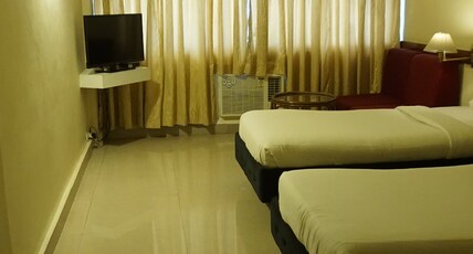 Hotel Poonja International Room Type - Economy Ac