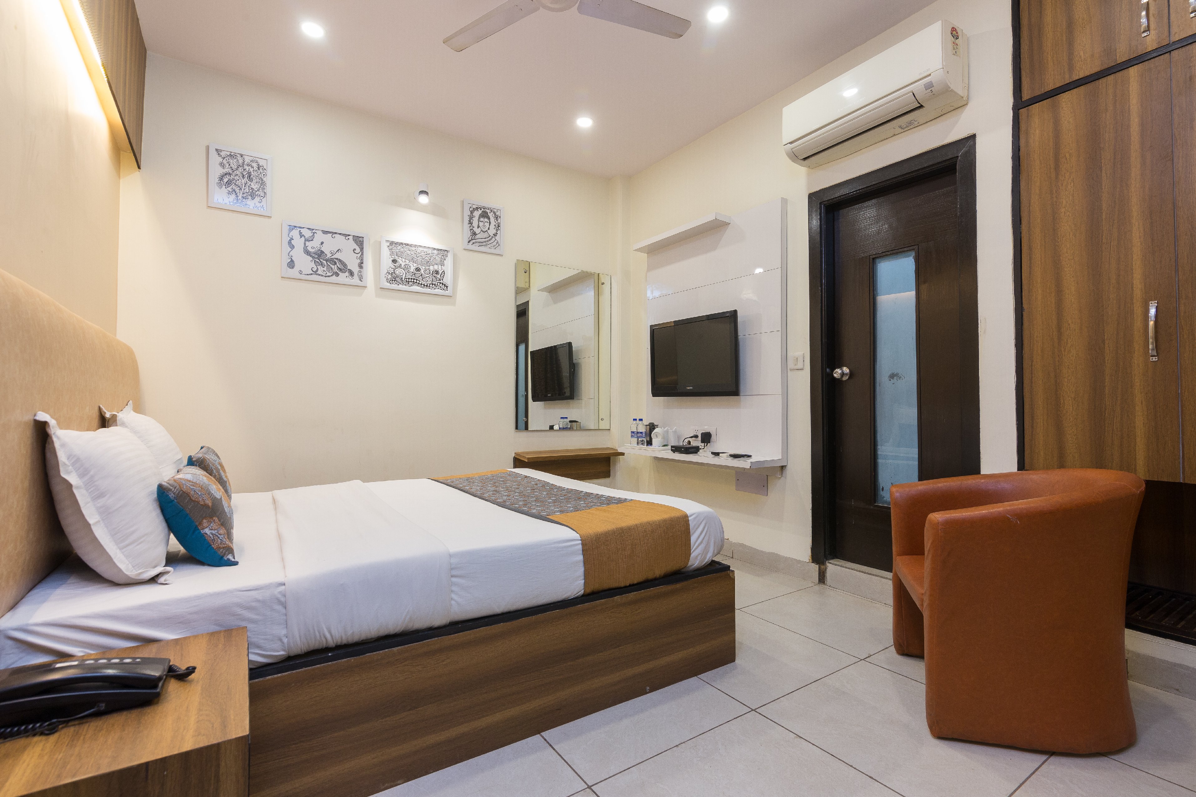 Rupam Hotel - Air Purified Comfort - Tap to explore photos