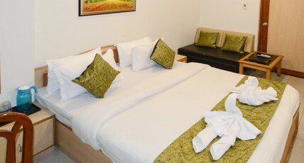 Hotel Maruti Ahmedabad Room Type - Deluxe King Bed Room