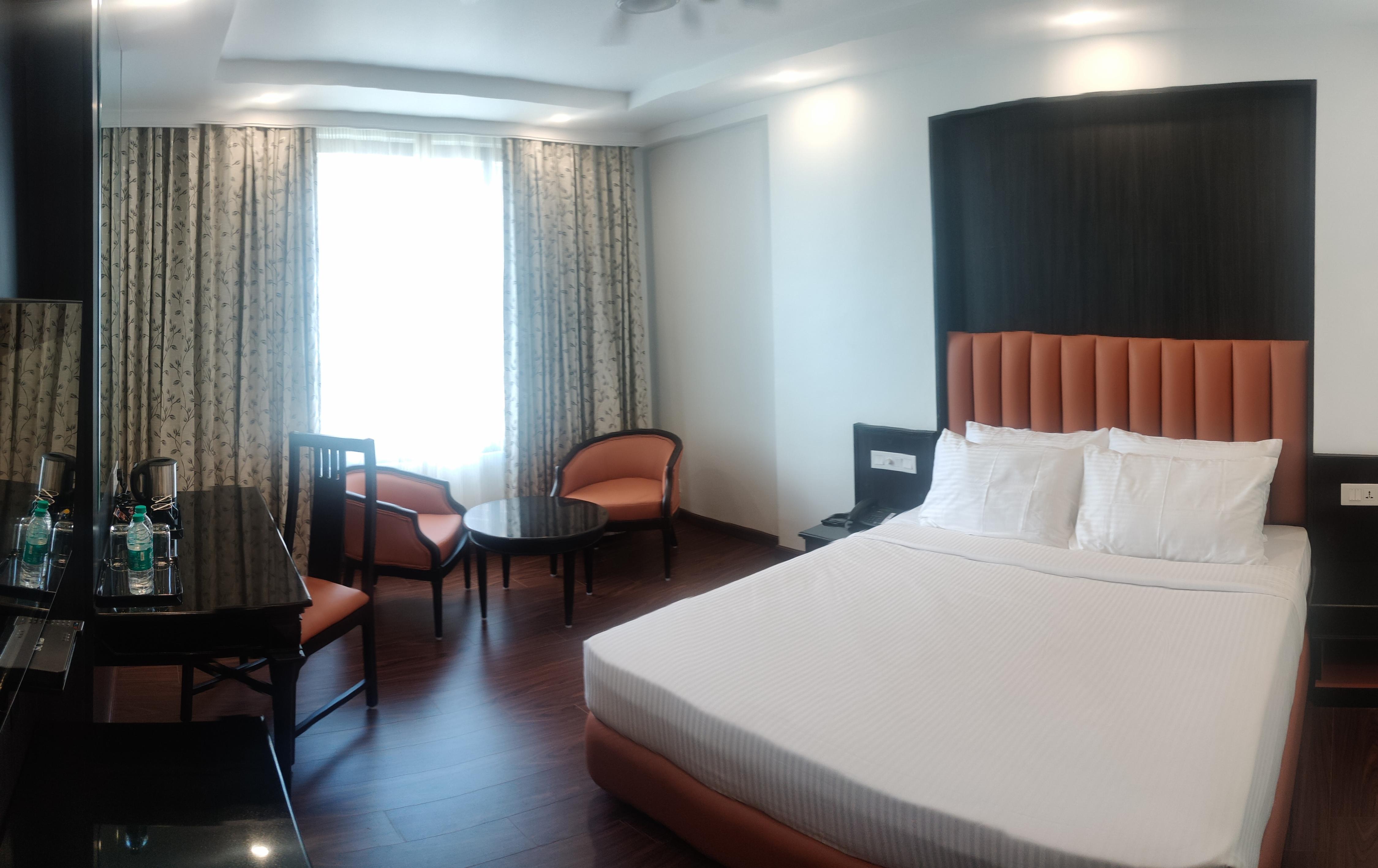 Hotel Heritage Inn Room Type - Comfort Room King Bed