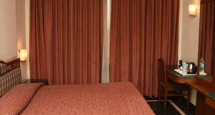 Hotel Maurya  Room Type - Deluxe AC Room