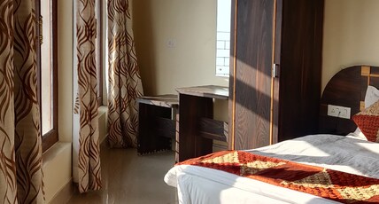 Hotel Welcome Park(walkable distance from mall road) Room Type - Family Room with Lake View Room