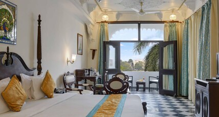 SWAROOP VILAS - LAKE FACING BOUTIQUE HOTEL Room Type - Serene Lake view Suite with balcony