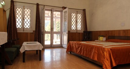 Hotel Devdar, Khajjiar (HPTDC) Room Type - Double Bed Room Cozy Deluxe