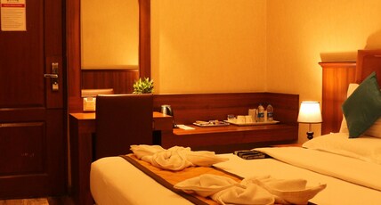 NOOR EMPIRE INTERNATIONAL Room Type - Deluxe Double Room-AC