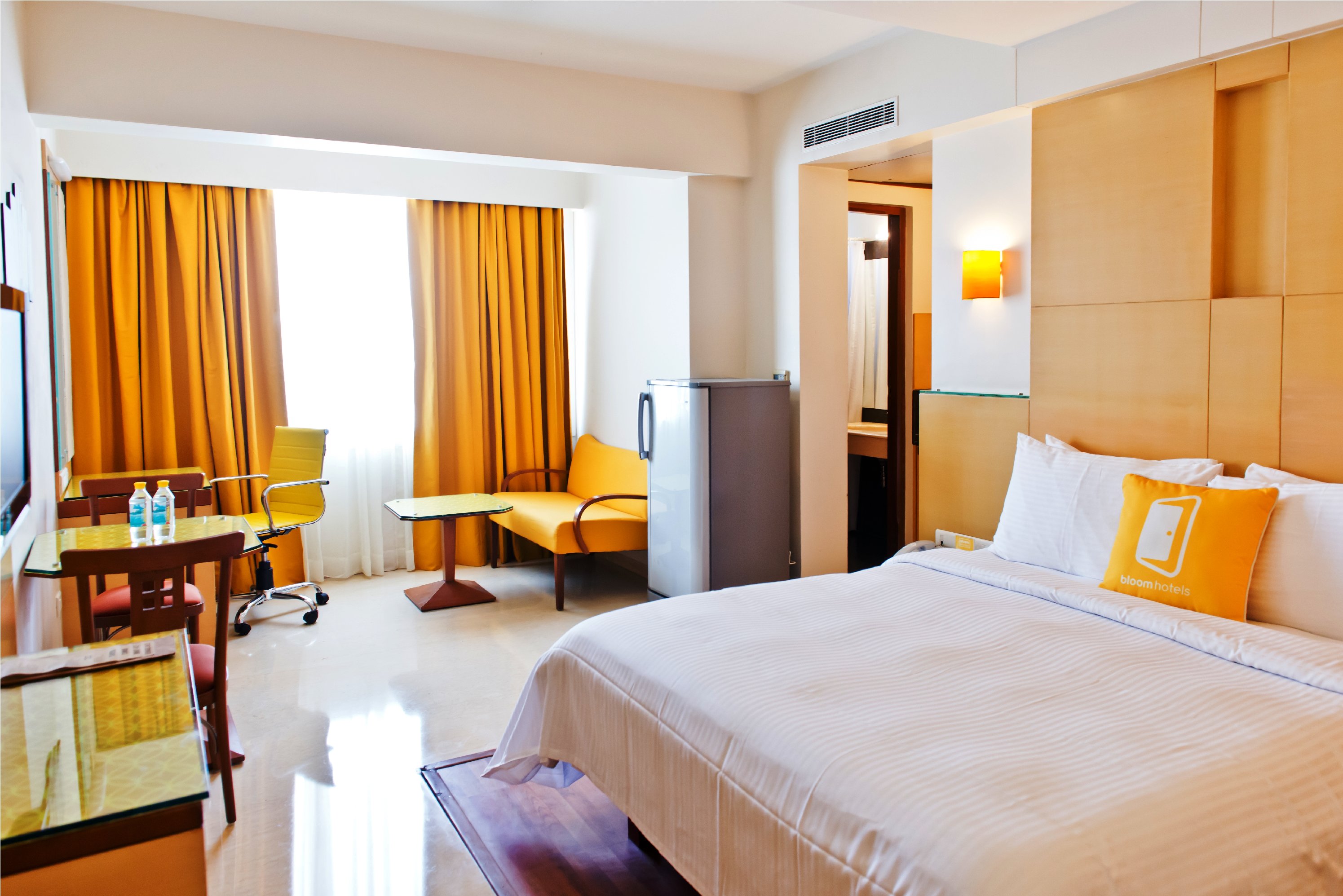 Bloom Hotel - Indiranagar - Tap to explore photos