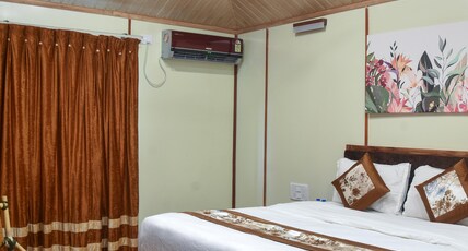 EXOTICA BEACH RESORT Room Type - AC COTTAGE ROOM