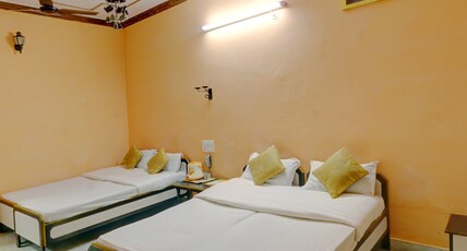Hotel Jaisal Palace (Pure Vegetarian) Jaisalmer Room Type - Family Room (4 Bed) Non AC Ground Floor Hotel Jaisal Palace (Pure Vegetarian) Jaisalmer Room Type - Family Room (4 Bed) Non AC Ground Floor