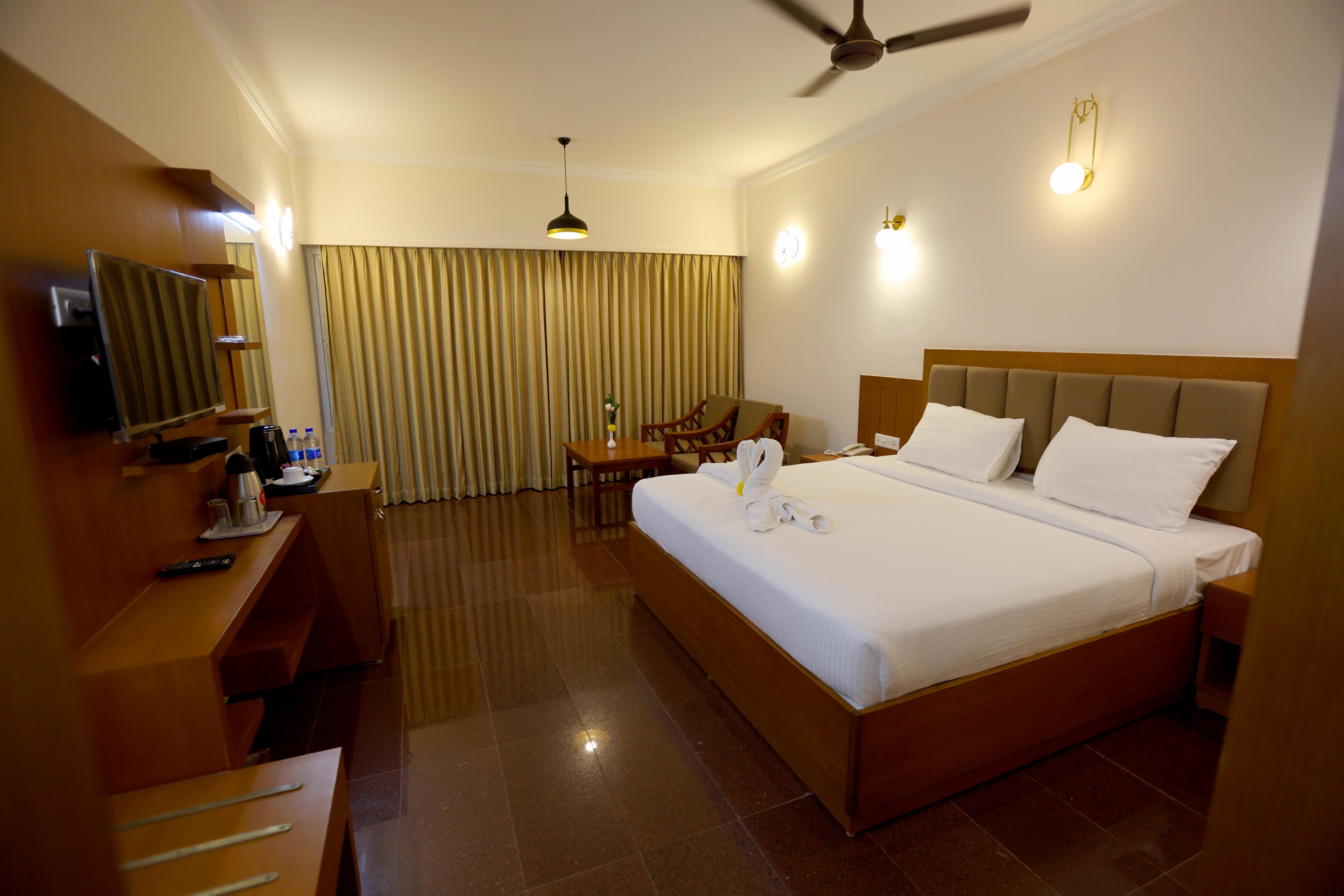Breeze Residency  Room Type - Deluxe Room with 10 Percent discount on food and new liquor