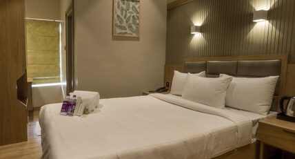 Hotel Mintflower Room Type - PREMIUM  AC