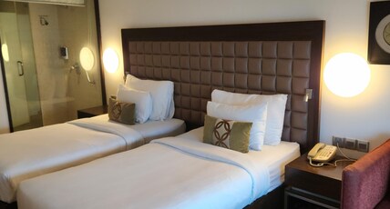 Pride Premier Bengaluru Room Type - Deluxe Twin Room