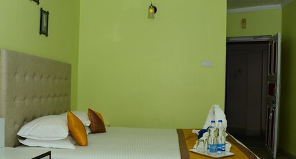 Hotel Dolphin Room Type - Standard Ac Garden Facing , Ground Floor , Private Balcony , Free Wi-Fi.