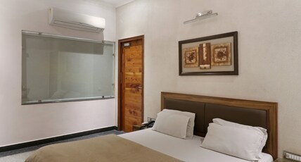 Hotel The Urmi Haridwar@Har Ki Pauri Road Room Type - Royal Premiere Room Hotel The Urmi Haridwar@Har Ki Pauri Road Room Type - Royal Premiere Room
