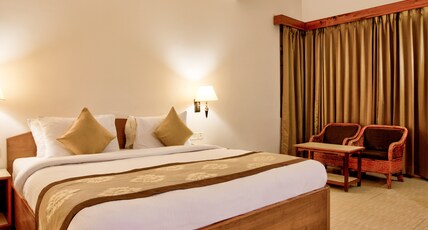 Summit Ttakshang Residency Hotel & Spa (2 Mins Walk to MG Marg) Room Type - Deluxe Room Summit Ttakshang Residency Hotel & Spa (2 Mins Walk to MG Marg) Room Type - Deluxe Room