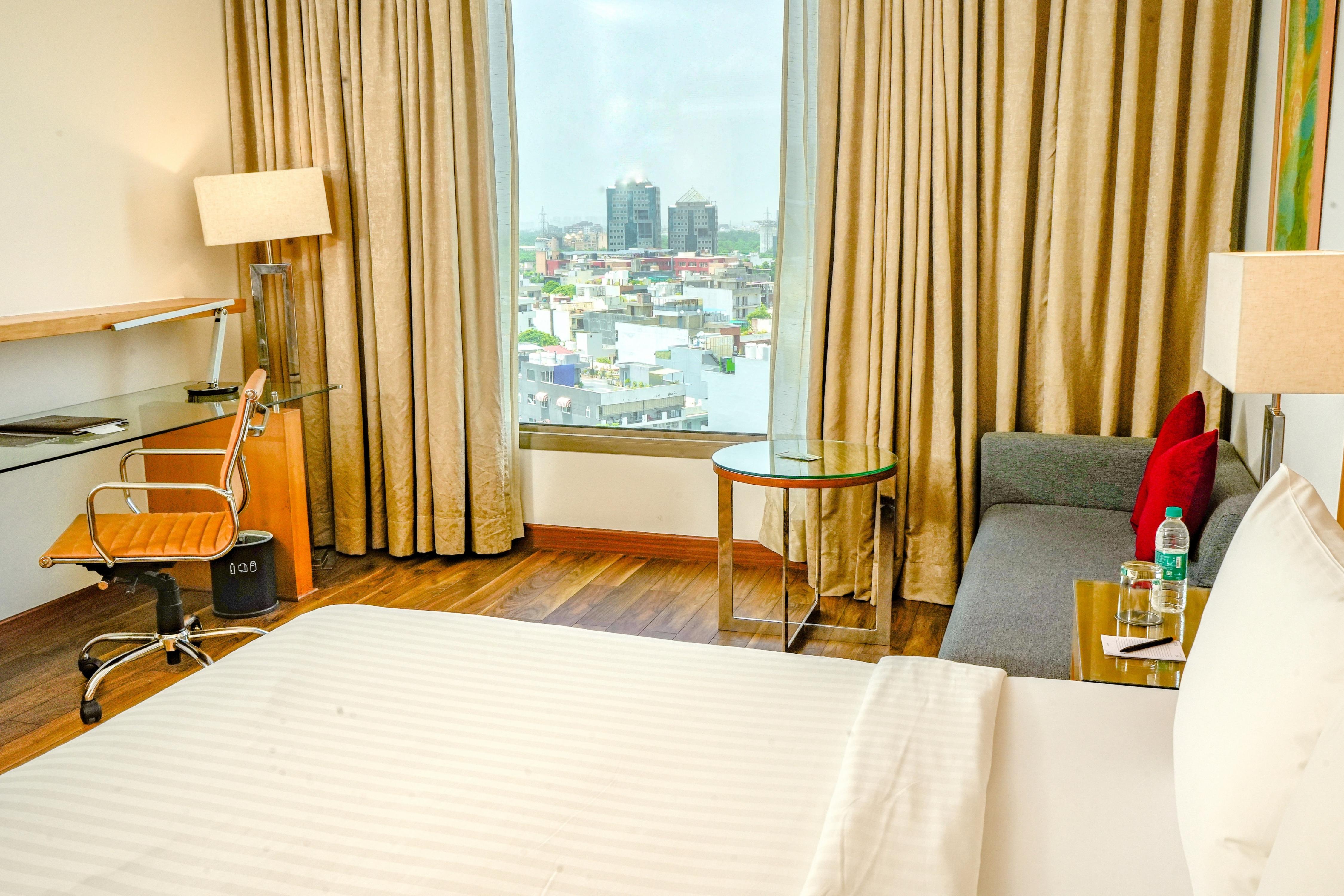 Courtyard by Marriott Gurugram Downtown, Gurgaon - Tap to explore photos