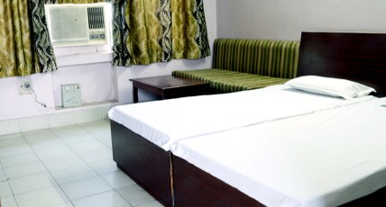 Hotel Prayag Room Type - AC Deluxe Room