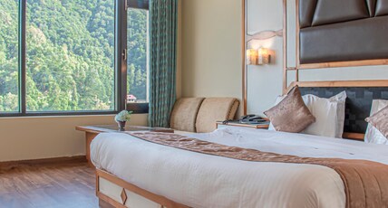 Sukhsagar Regency | Indoor heated pool Room Type - Deluxe Room AC/Heating