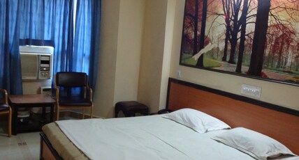 Chaitanya International Room Type - Deluxe AC Room