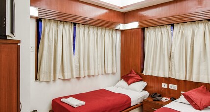 Hotel Aston Room Type - Deluxe Double Twin Bed Ac Room