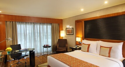 Gokulam Grand Hotel & Spa Room Type - Deluxe Room
