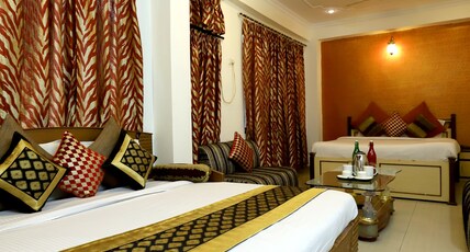 Hotel Suncity @Harkipauri road by Pleasant stayz Room Type - Family Suite (4 Bed) - Corona Disinfected Rooms Hotel Suncity @Harkipauri road by Pleasant stayz Room Type - Family Suite (4 Bed) - Corona Disinfected Rooms
