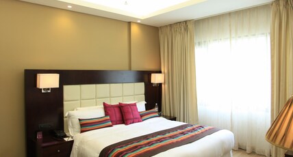 Hotel Rock Manali ( Akhnoor Hotels Pvt. Ltd.) Room Type - King Suite River View - Mountain View | Bathtub | Balcony