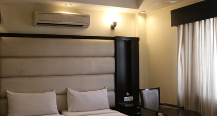 Hotel Meridian Plaza Room Type - Deluxe Room.